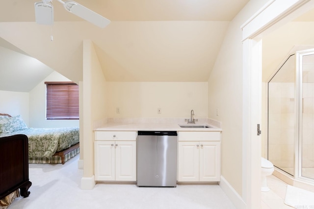 bar featuring a sink, vaulted ceiling, stainless steel dishwasher, and light colored carpet