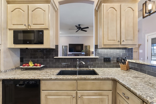 kitchen with black appliances, crown molding, light brown cabinets, and a sink