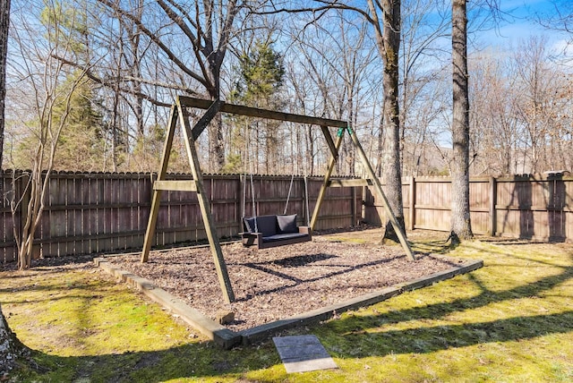 view of play area featuring a yard and a fenced backyard