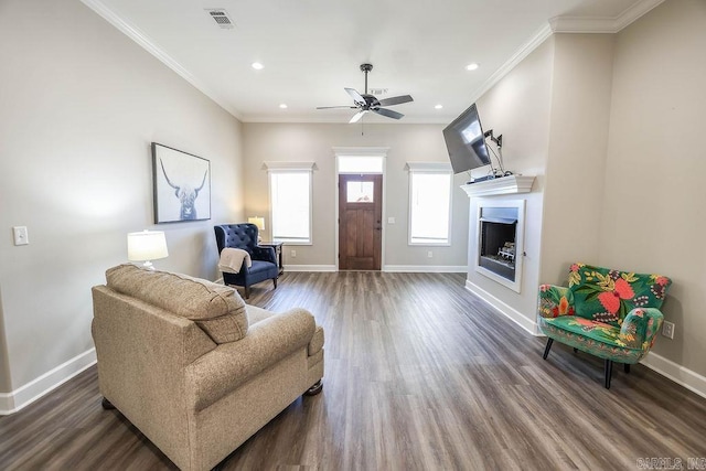 interior space with dark wood-style flooring, visible vents, and baseboards