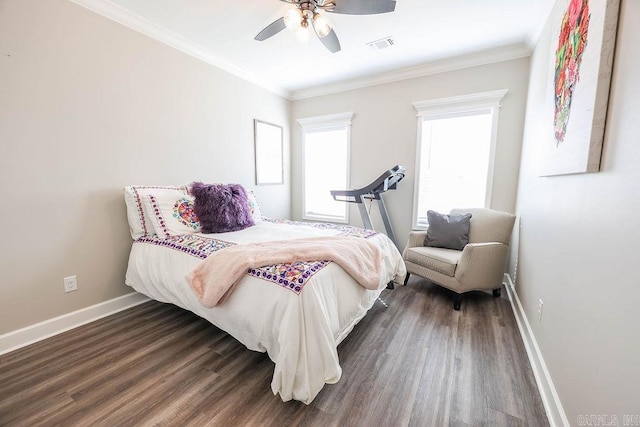 bedroom with baseboards, visible vents, ceiling fan, ornamental molding, and dark wood-style flooring