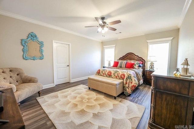 bedroom featuring dark wood-style floors, baseboards, visible vents, and ornamental molding