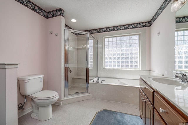 bathroom with toilet, a textured ceiling, a shower stall, vanity, and a bath