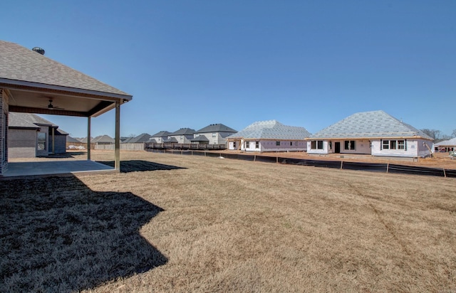 view of yard featuring a patio area and fence