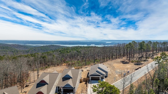 bird's eye view featuring a view of trees