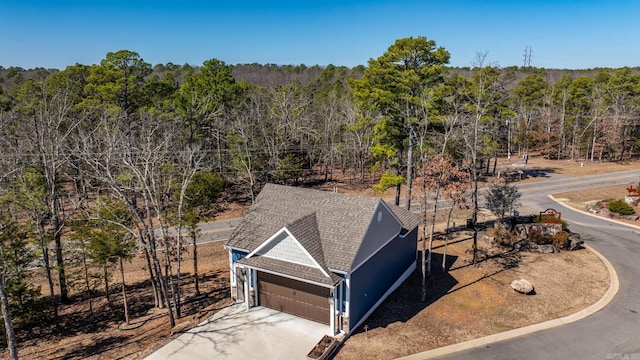 aerial view with a wooded view