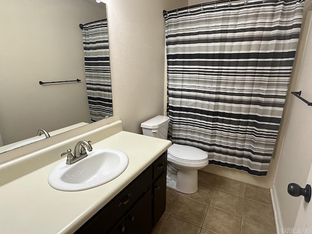 full bathroom with a shower with curtain, vanity, toilet, and tile patterned floors