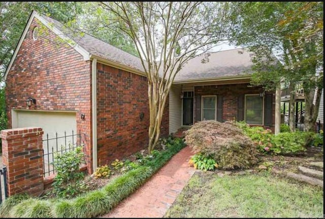 view of front of property with brick siding