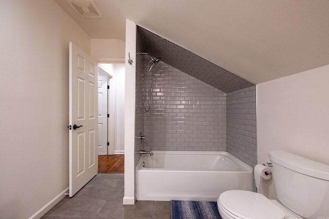 full bathroom featuring shower / bath combination, visible vents, toilet, tile patterned flooring, and baseboards