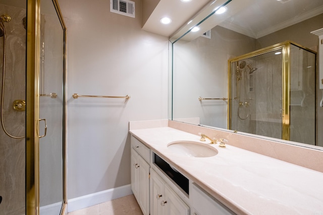 full bath featuring crown molding, visible vents, a shower stall, vanity, and tile patterned floors