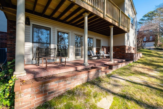 deck featuring a porch and central air condition unit