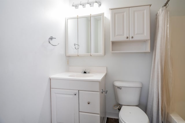 full bath with toilet and vanity