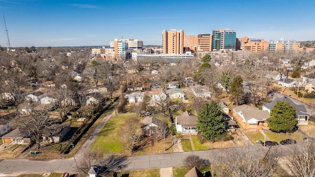 birds eye view of property featuring a city view