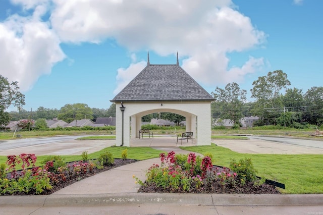 view of community featuring a gazebo and a yard