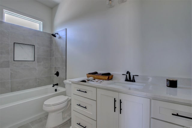 bathroom with shower / bath combination, vanity, toilet, and tile patterned floors