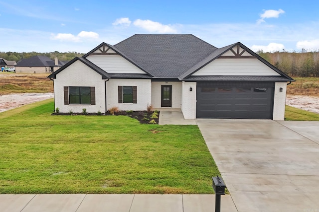 view of front facade with a garage, a shingled roof, brick siding, concrete driveway, and a front lawn