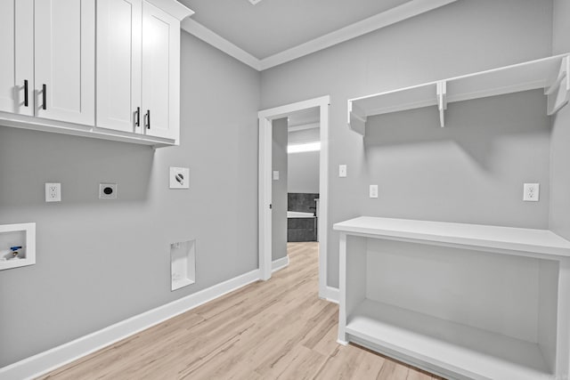 laundry area featuring cabinet space, baseboards, hookup for a washing machine, light wood-style floors, and electric dryer hookup