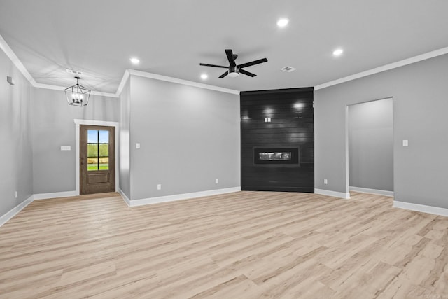 unfurnished living room featuring a large fireplace, baseboards, visible vents, light wood-type flooring, and recessed lighting