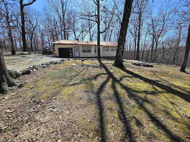 view of front of home featuring a garage and driveway