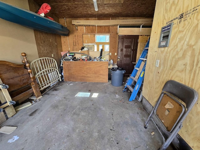 misc room featuring unfinished concrete flooring