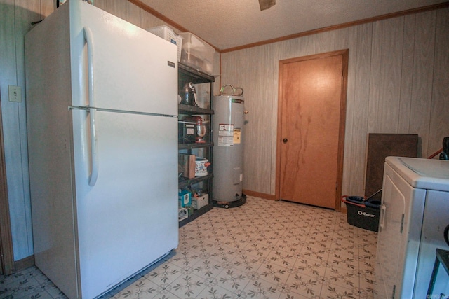 interior space featuring water heater and washer / dryer