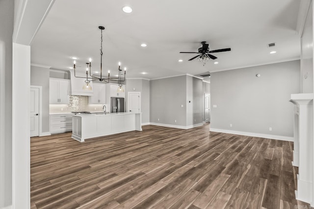 unfurnished living room with dark wood-style floors, recessed lighting, and ceiling fan