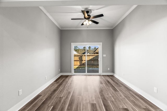 unfurnished room featuring ornamental molding, dark wood finished floors, baseboards, and a ceiling fan