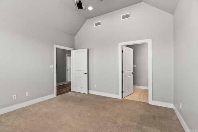 unfurnished bedroom featuring carpet flooring, visible vents, and baseboards