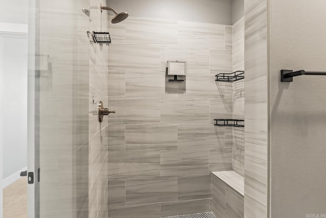 bathroom featuring a stall shower