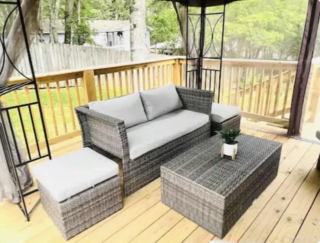 deck with an outdoor living space