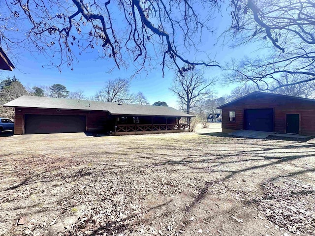 view of side of property with driveway