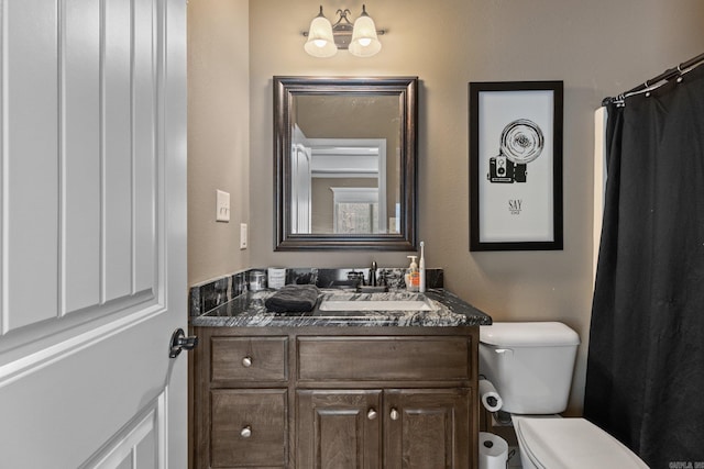 full bath with vanity and toilet