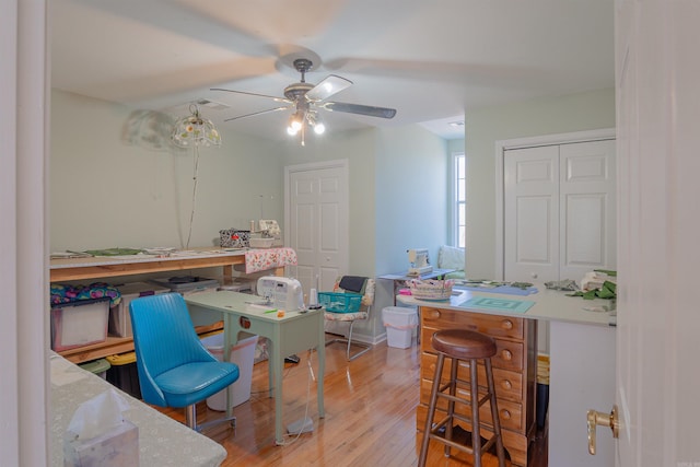 dining area featuring ceiling fan, visible vents, and wood finished floors