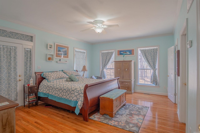 bedroom with ceiling fan, baseboards, light wood-style floors, access to outside, and crown molding