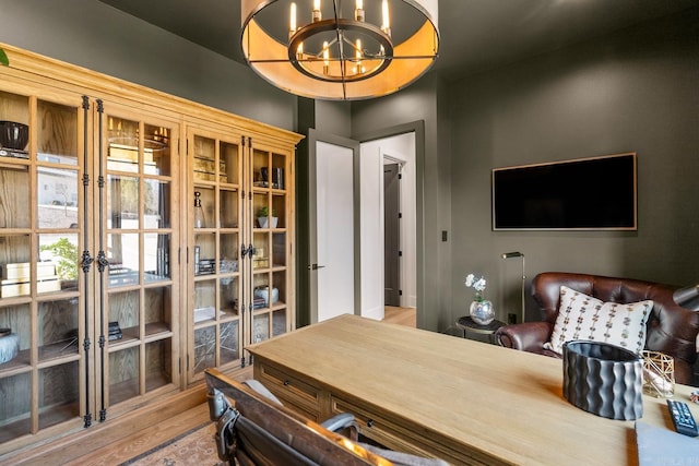 108 Mornay Ln, Little Rock, AR 72223 - office area featuring a chandelier, french doors, and wood finished floors