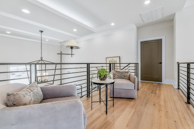 108 Mornay Ln, Little Rock, AR 72223 - sitting room with visible vents, an inviting chandelier, light wood-style floors, beam ceiling, and recessed lighting