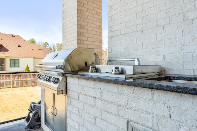 108 Mornay Ln, Little Rock, AR 72223 - view of patio / terrace with exterior kitchen, a grill, and fence