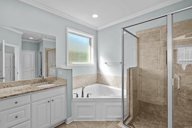 bathroom featuring a garden tub, a shower stall, crown molding, and vanity