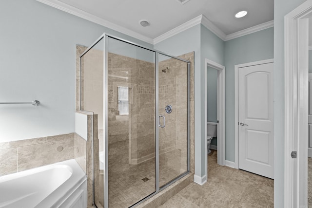 full bath with a stall shower, toilet, ornamental molding, a garden tub, and tile patterned flooring