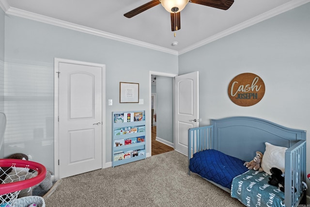 bedroom featuring baseboards, carpet, a ceiling fan, and crown molding