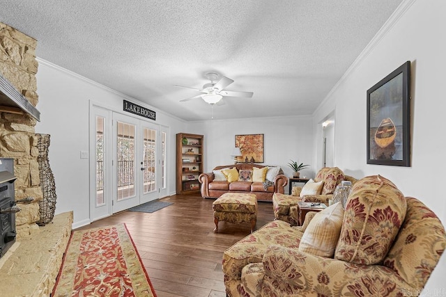 living room featuring ornamental molding, french doors, ceiling fan, and hardwood / wood-style floors