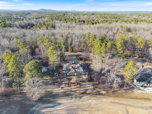 aerial view featuring a forest view