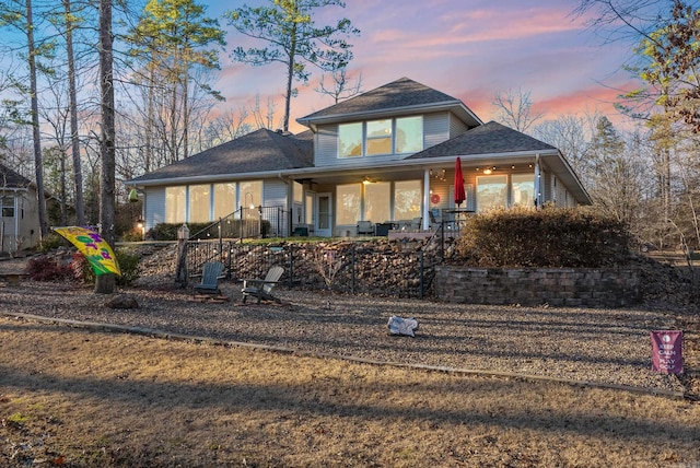 view of front of home featuring a fenced front yard and covered porch