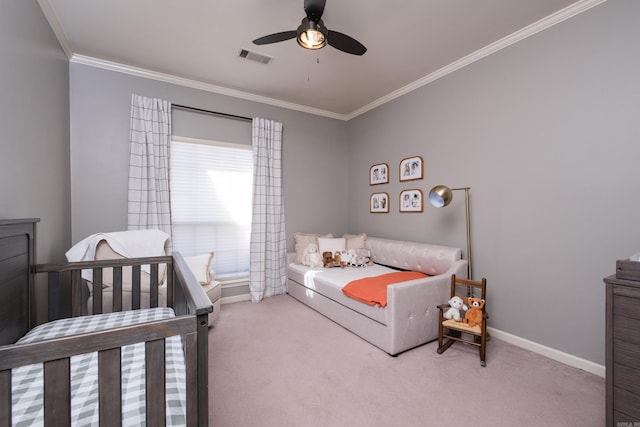 bedroom featuring visible vents, baseboards, ceiling fan, ornamental molding, and carpet