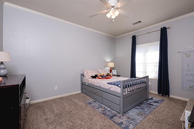 carpeted bedroom with a ceiling fan, visible vents, crown molding, and baseboards