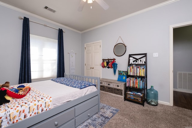 bedroom featuring ornamental molding, carpet, visible vents, and baseboards