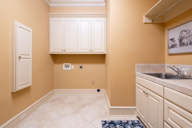 laundry area with hookup for a gas dryer, hookup for an electric dryer, washer hookup, a sink, and cabinet space