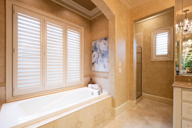 bathroom featuring ornamental molding, a garden tub, tile patterned flooring, vanity, and a shower stall