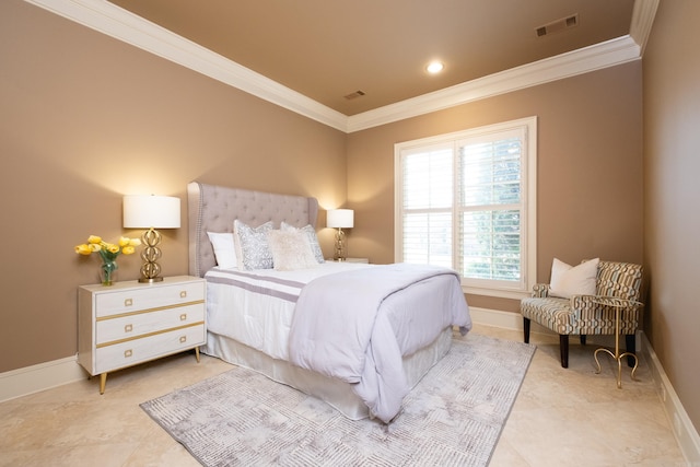 bedroom with baseboards, visible vents, and ornamental molding