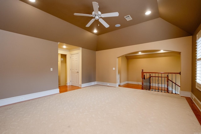 additional living space with lofted ceiling, baseboards, and recessed lighting